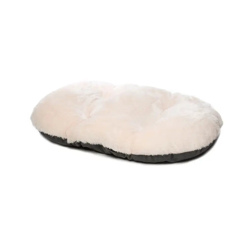 Nordic Oval Pet Cushion showing the plush grey faux fur side and the smooth suedette reverse side.
